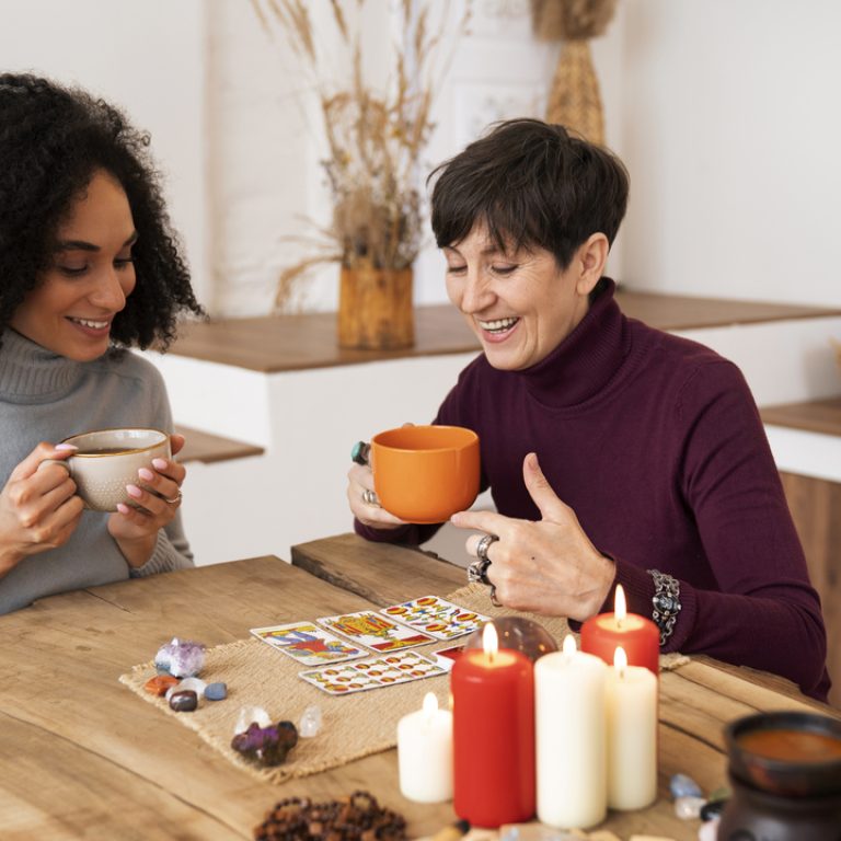 medium-shot-women-reading-tarot (1)