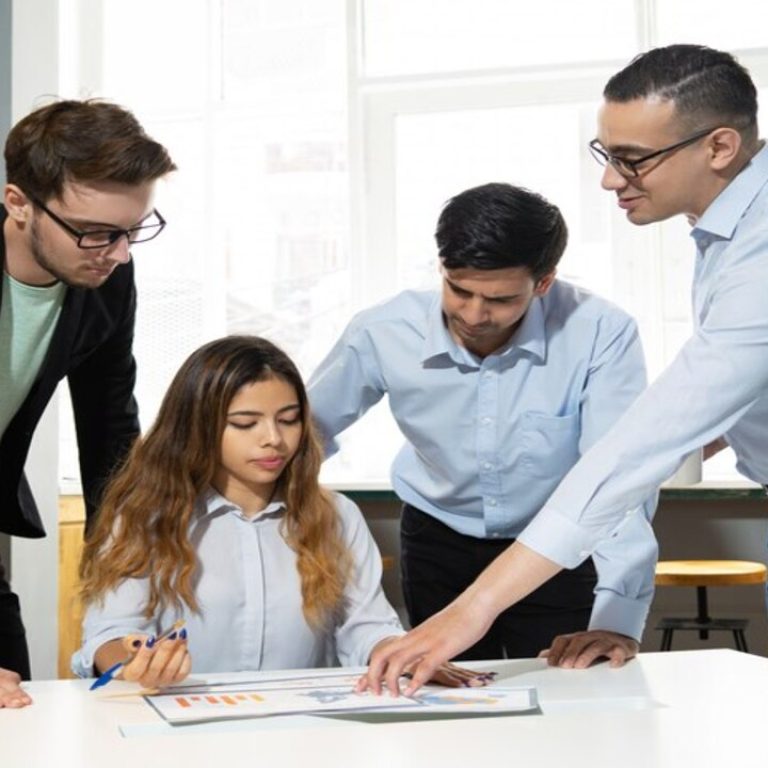 mentor-explaining-marketing-data-interns_1262-16199 (1)